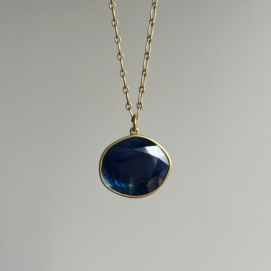 Stormy Blue Sapphire Sequin Pendant