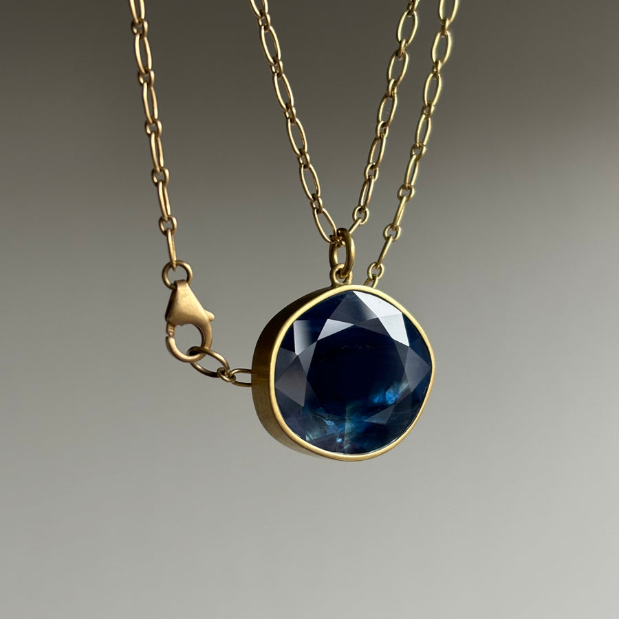 Stormy Blue Sapphire Sequin Pendant